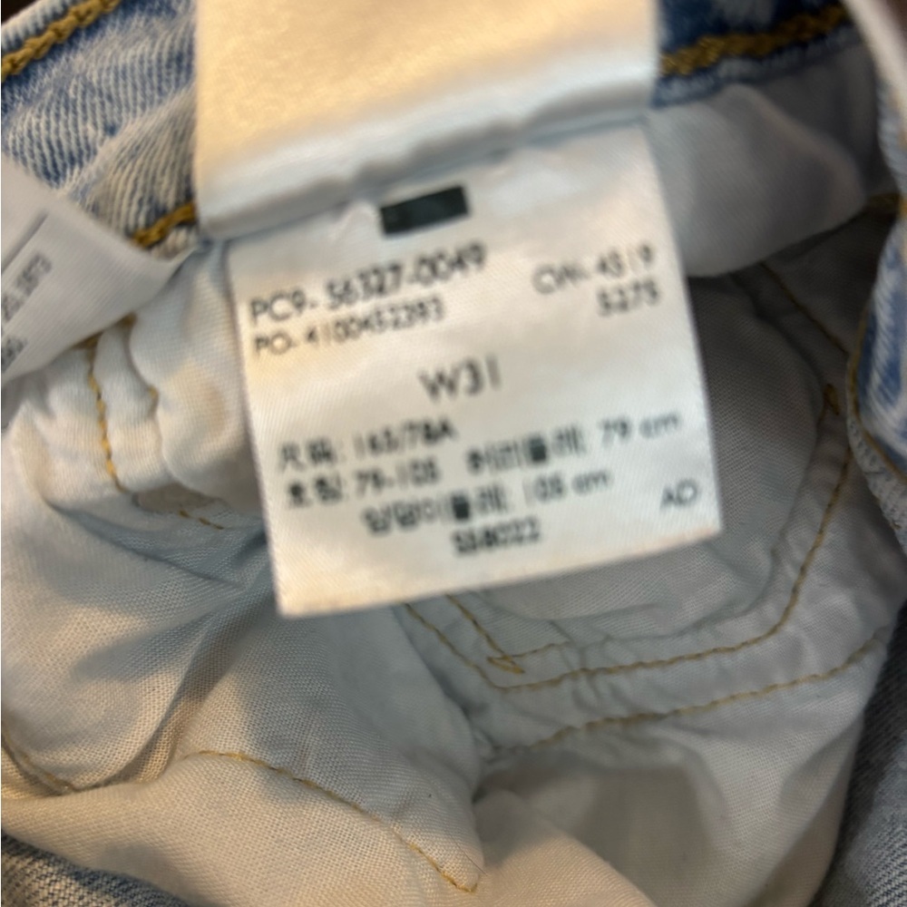 Levi's Premium 501 Light Blue Distressed Denim Shorts - Picture 7 of 9